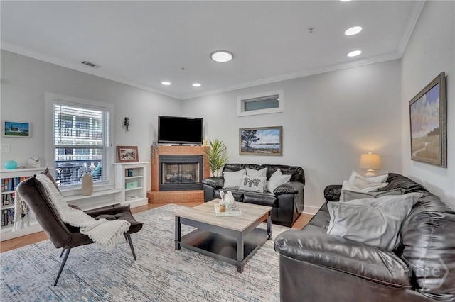 5 17th St, Tybee Island, GA 31328 - living area featuring recessed lighting, ornamental molding, and a tiled fireplace