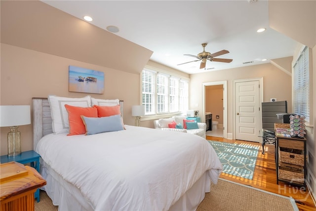 bedroom with wood finished floors, recessed lighting, a ceiling fan, and baseboards