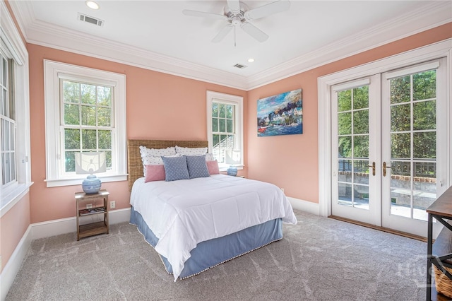 carpeted bedroom with access to exterior, french doors, baseboards, crown molding, and a ceiling fan