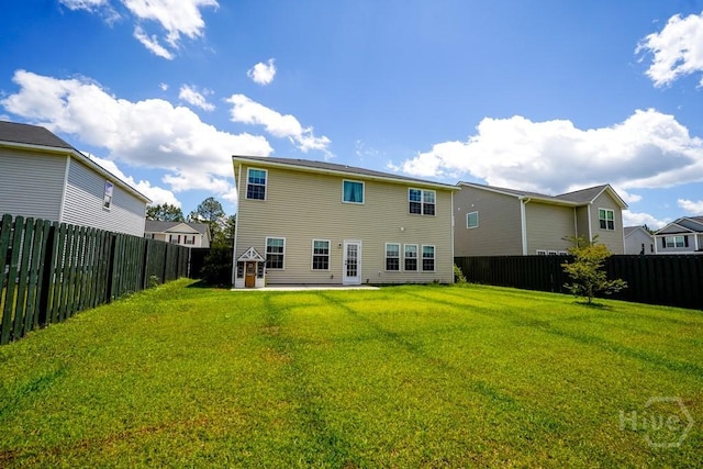 24 Daylily Ct, Hinesville, GA 31313 - back of property with a patio area