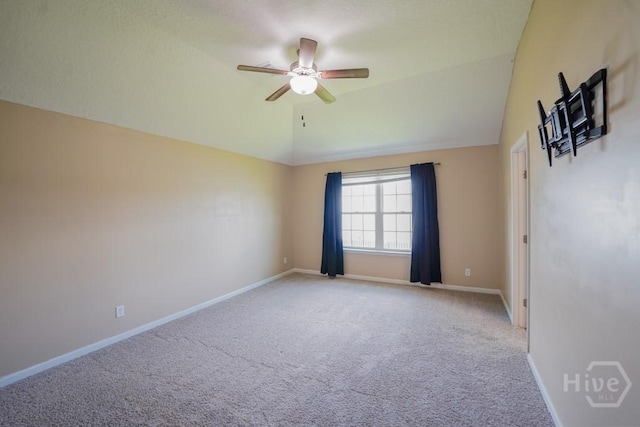 24 Daylily Ct, Hinesville, GA 31313 - empty room with carpet flooring, lofted ceiling, ceiling fan, and baseboards