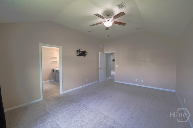 24 Daylily Ct, Hinesville, GA 31313 - unfurnished bedroom with vaulted ceiling, light carpet, baseboards, and ceiling fan