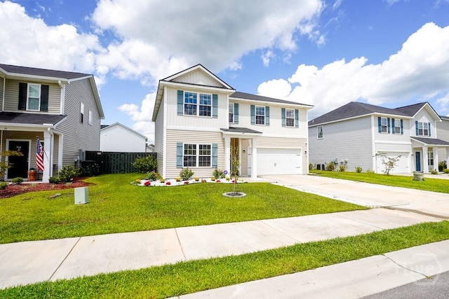 24 Daylily Ct, Hinesville, GA 31313 - traditional-style home featuring an attached garage, concrete driveway, and board and batten siding