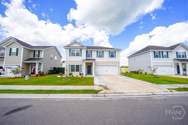 24 Daylily Ct, Hinesville, GA 31313 - traditional-style home featuring a garage, concrete driveway, and a front lawn