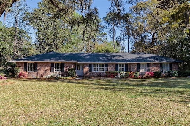 2 S Millward Rd, Savannah, GA 31410 - single story home featuring a front yard and brick siding