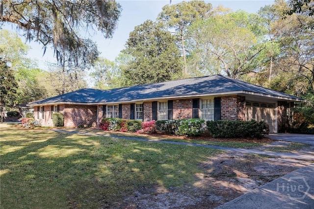 2 S Millward Rd, Savannah, GA 31410 - ranch-style home featuring brick siding, an attached garage, a front yard, and driveway