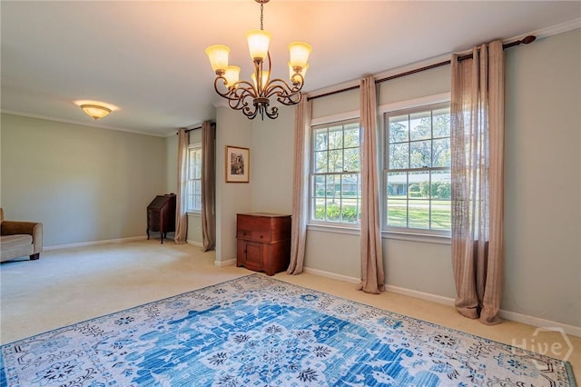 2 S Millward Rd, Savannah, GA 31410 - unfurnished room with carpet flooring, a chandelier, healthy amount of natural light, baseboards, and crown molding