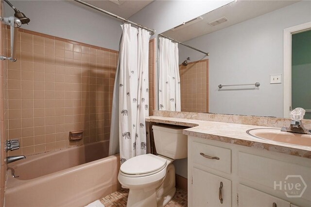 2 S Millward Rd, Savannah, GA 31410 - bathroom featuring shower / bath combo with shower curtain, toilet, and vanity