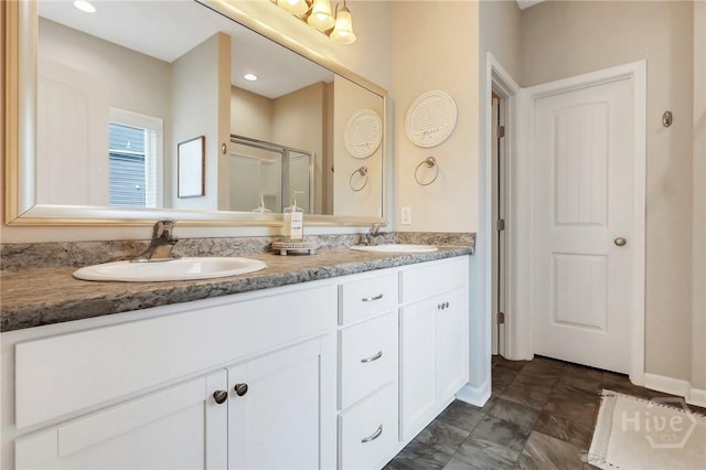 374 Bobwhite Trl NE, Ludowici, GA 31316 - bathroom with a stall shower and double vanity