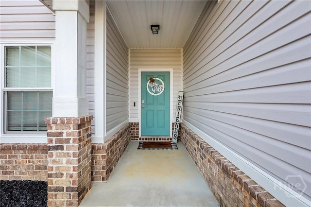 374 Bobwhite Trl NE, Ludowici, GA 31316 - entrance to property featuring covered porch
