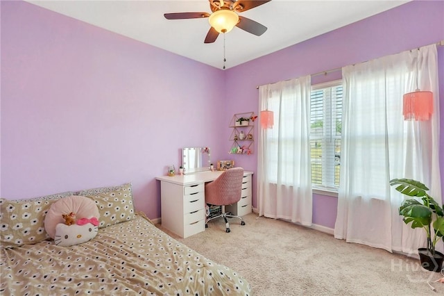 374 Bobwhite Trl NE, Ludowici, GA 31316 - bedroom featuring carpet, baseboards, a desk, and a ceiling fan