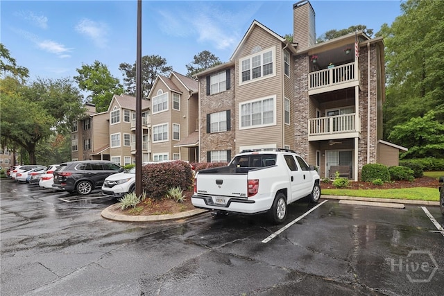 12300 Apache Ave Unit 1716, Savannah, GA 31419 - view of building exterior featuring uncovered parking
