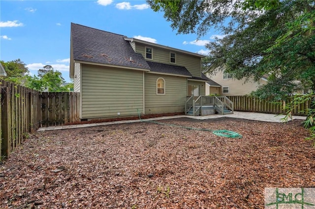 539 Pointe S Dr, Savannah, GA 31410 - rear view of property with roof with shingles, a fenced backyard, a patio, and a wooden deck