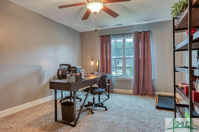 office featuring carpet, baseboards, and a ceiling fan