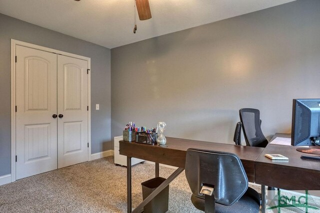 office with carpet flooring, a ceiling fan, and baseboards