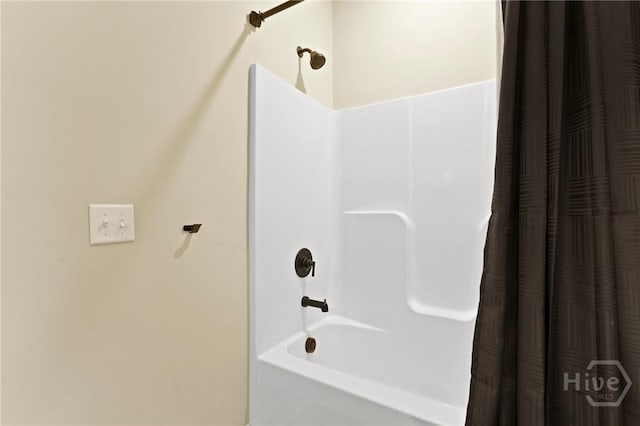 full bathroom with shower / bath combination with curtain