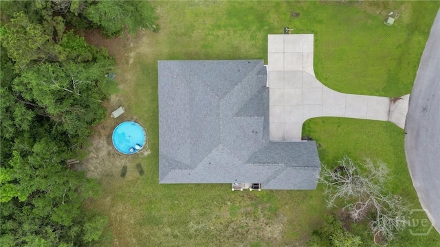 view from above of property with a pool area