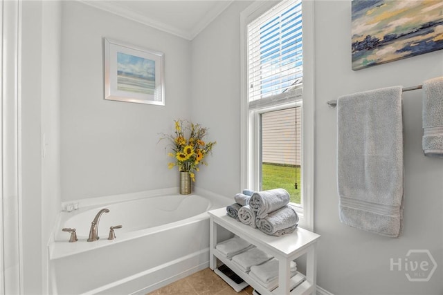 full bathroom featuring ornamental molding, a garden tub, and tile patterned flooring