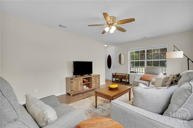 2 Mclaughlin Ct, Savannah, GA 31419 - living area with wood finished floors, ceiling fan, and baseboards