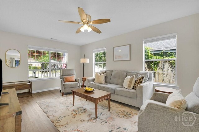 2 Mclaughlin Ct, Savannah, GA 31419 - living room featuring light wood-type flooring, ceiling fan, and baseboards