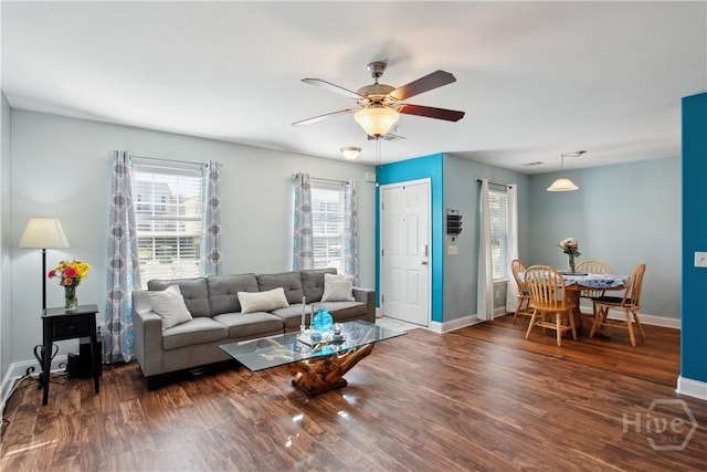25 Fiore Dr, Savannah, GA 31419 - living room with healthy amount of natural light, a ceiling fan, wood finished floors, and baseboards