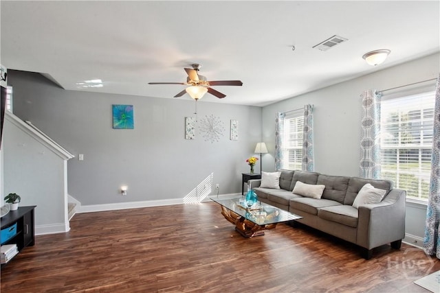 25 Fiore Dr, Savannah, GA 31419 - living area with healthy amount of natural light, stairway, ceiling fan, and wood finished floors
