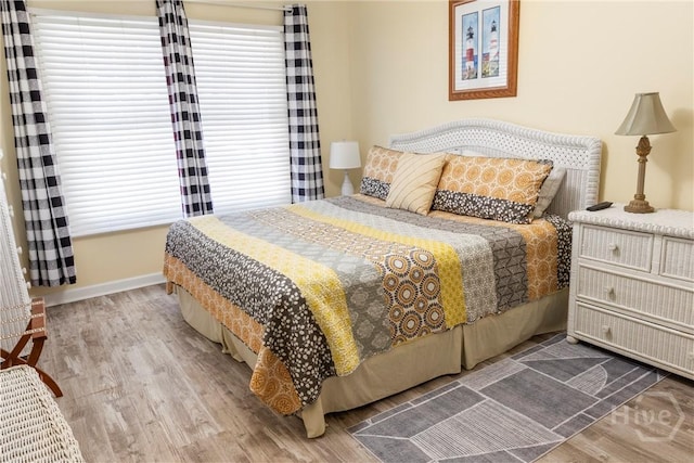 3 3rd St Unit 538, Tybee Island, GA 31328 - bedroom featuring wood finished floors and baseboards