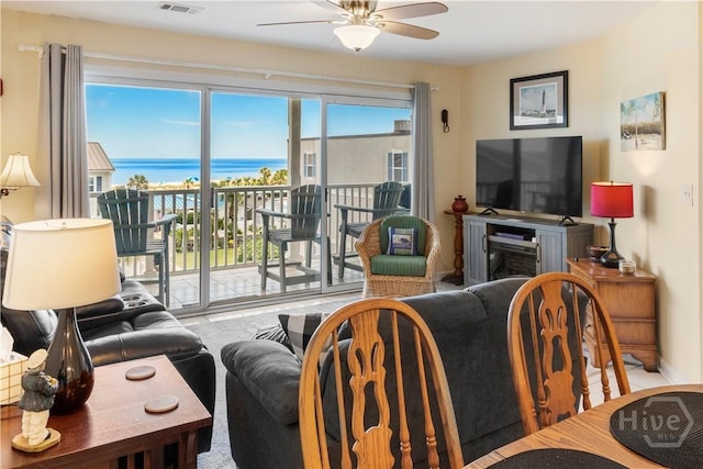 3 3rd St Unit 538, Tybee Island, GA 31328 - living room with ceiling fan and healthy amount of natural light