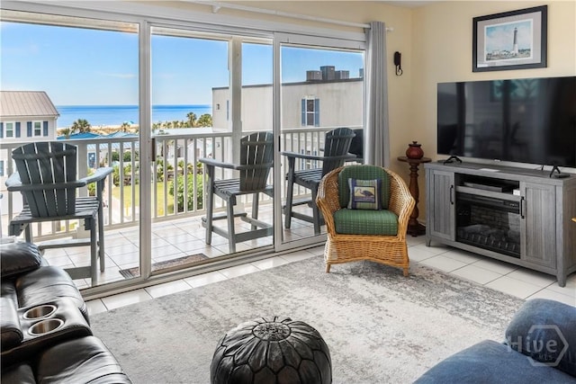 3 3rd St Unit 538, Tybee Island, GA 31328 - living room featuring tile patterned floors and plenty of natural light