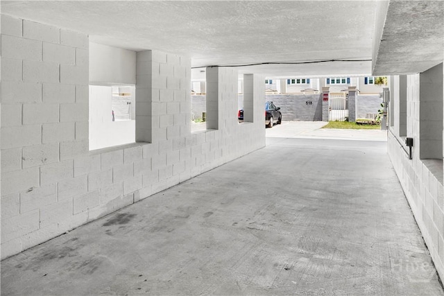 3 3rd St Unit 538, Tybee Island, GA 31328 - garage featuring concrete block wall