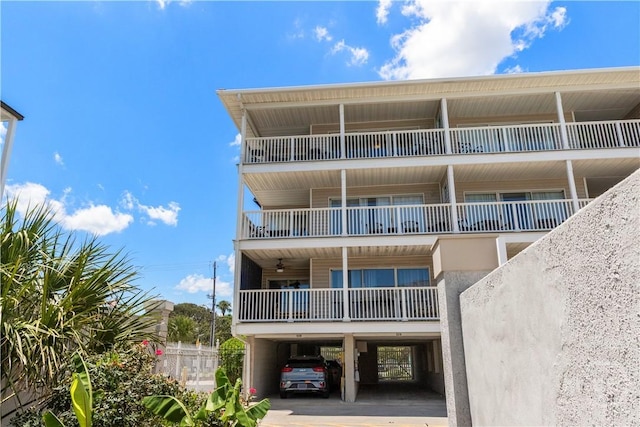 3 3rd St Unit 538, Tybee Island, GA 31328 - view of property with a carport