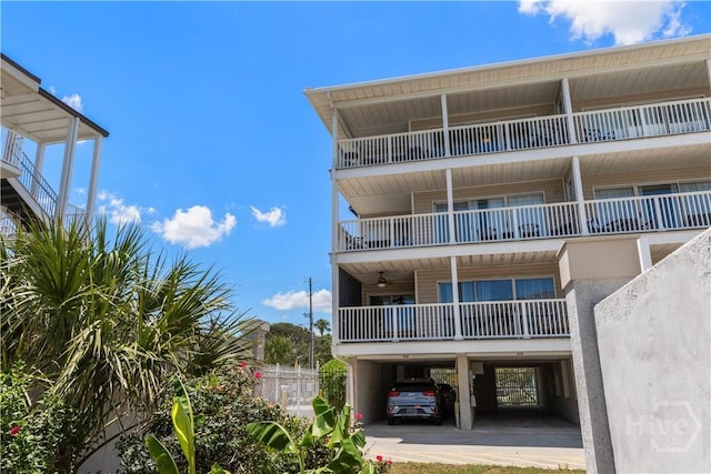3 3rd St Unit 538, Tybee Island, GA 31328 - view of property with a carport