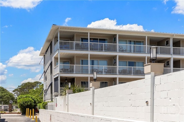 3 3rd St Unit 538, Tybee Island, GA 31328 - view of apartment building / complex with fence