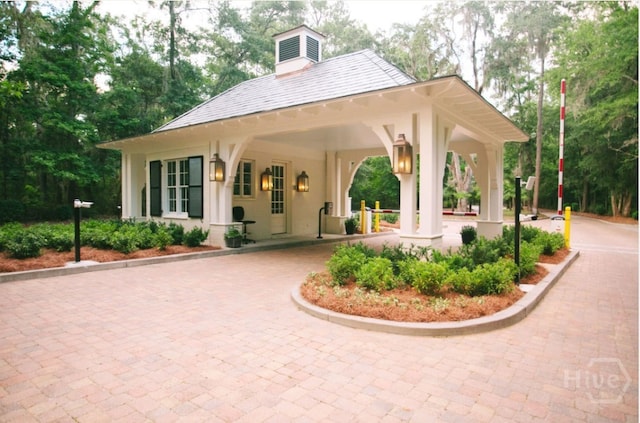 surrounding community featuring curved driveway