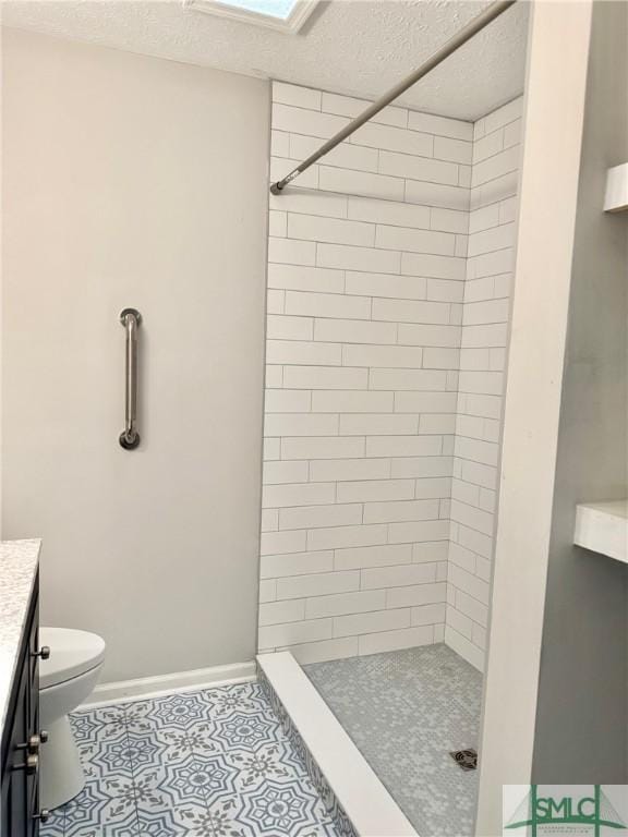 932 Millstream Ct, Savannah, GA 31419 - full bath with a shower stall, vanity, toilet, a textured ceiling, and tile patterned floors