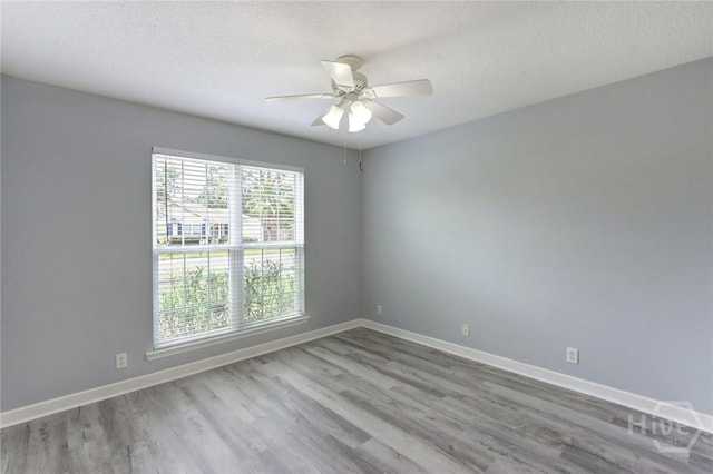 30 Bridgewater Way, Brunswick, GA 31525 - unfurnished room featuring wood finished floors, ceiling fan, and baseboards