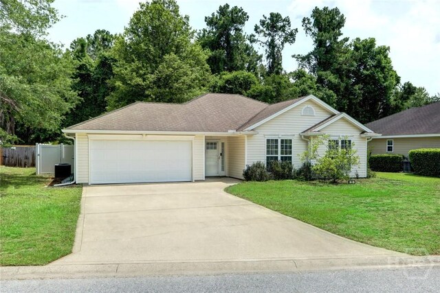 30 Bridgewater Way, Brunswick, GA 31525 - single story home with driveway, an attached garage, and central AC