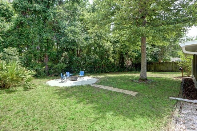 30 Bridgewater Way, Brunswick, GA 31525 - view of yard with a fire pit and a patio