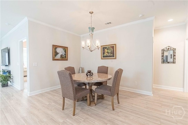 137 Harvest Hl, Pooler, GA 31322 - dining room with a chandelier, light wood-style flooring, baseboards, and ornamental molding