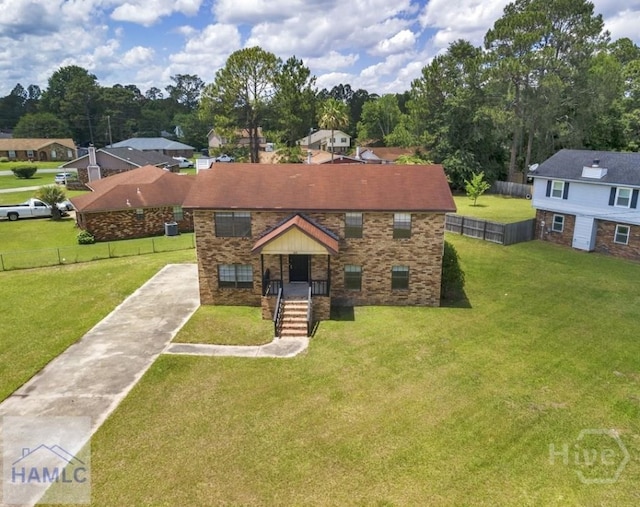 1021 Bacon Rd, Hinesville, GA 31313 - view of front facade with concrete driveway and brick siding