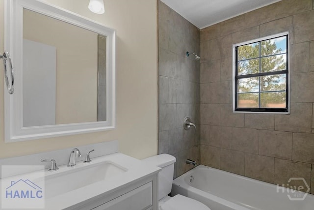 1021 Bacon Rd, Hinesville, GA 31313 - bathroom with vanity, washtub / shower combination, and toilet