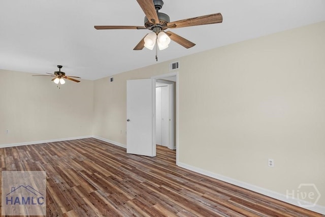 1021 Bacon Rd, Hinesville, GA 31313 - empty room featuring wood finished floors, ceiling fan, and baseboards