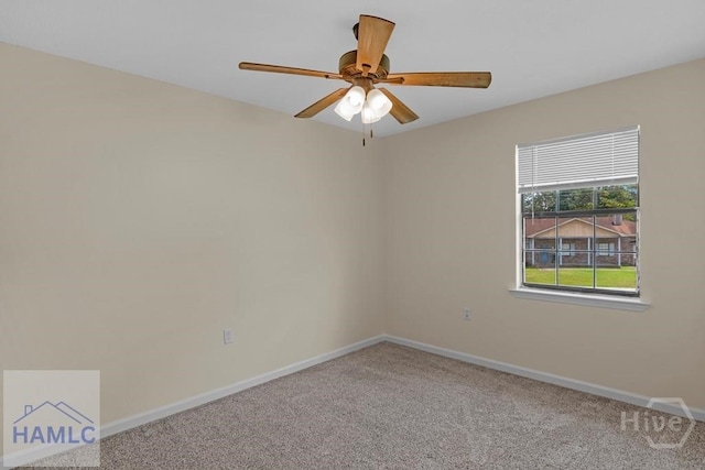 1021 Bacon Rd, Hinesville, GA 31313 - empty room with carpet, baseboards, and a ceiling fan