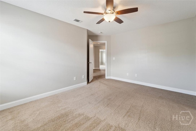 1107 Creekside Cir, Hinesville, GA 31313 - carpeted empty room featuring baseboards and a ceiling fan