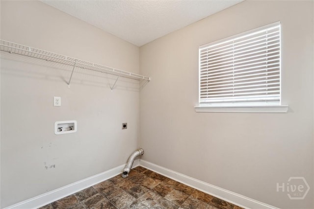 1107 Creekside Cir, Hinesville, GA 31313 - laundry area featuring hookup for a washing machine, baseboards, and electric dryer hookup