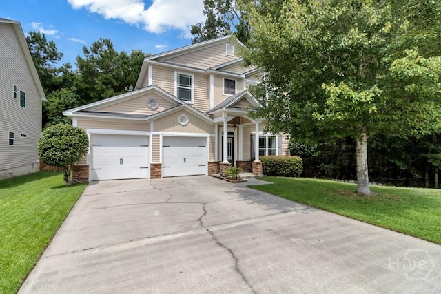 48 Chapel Lk N, Savannah, GA 31419 - view of front of property with concrete driveway, a front yard, and a garage