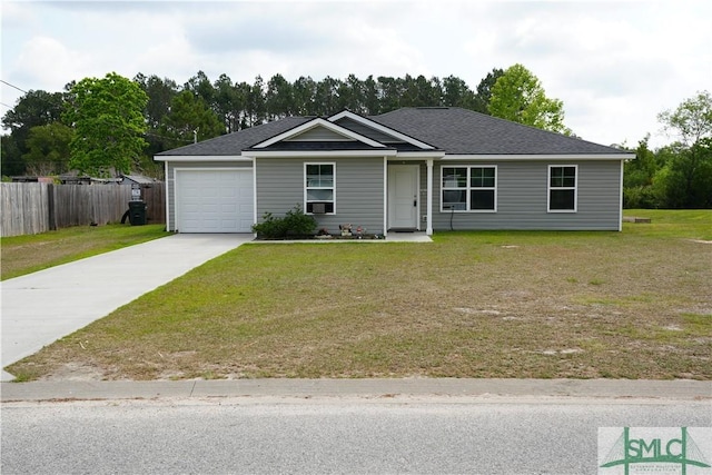 46 Persimmon Dr NE, Ludowici, GA 31316 - ranch-style home with a garage, driveway, and a shingled roof