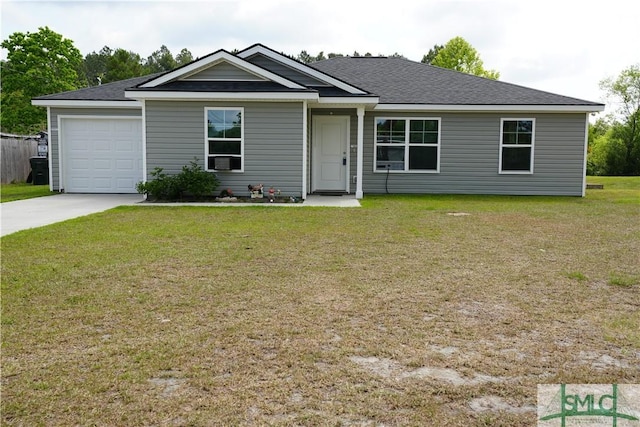 46 Persimmon Dr NE, Ludowici, GA 31316 - view of front facade with driveway, a front lawn, an attached garage, and roof with shingles