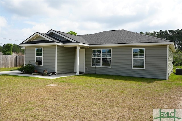 46 Persimmon Dr NE, Ludowici, GA 31316 - view of front of property with roof with shingles and central AC