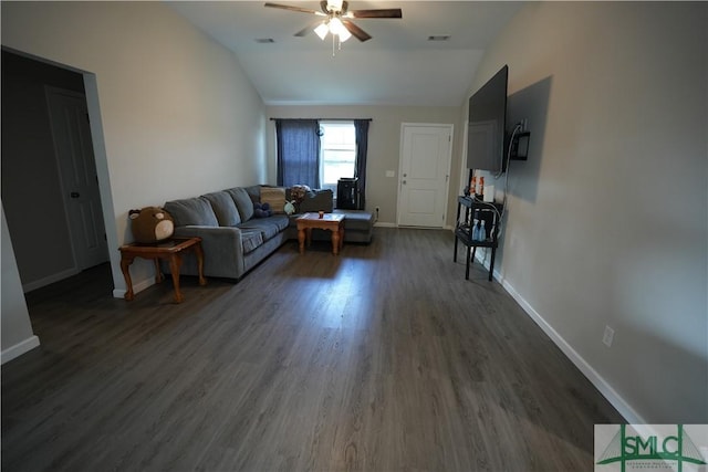 46 Persimmon Dr NE, Ludowici, GA 31316 - living area featuring ceiling fan, vaulted ceiling, dark wood-type flooring, and baseboards